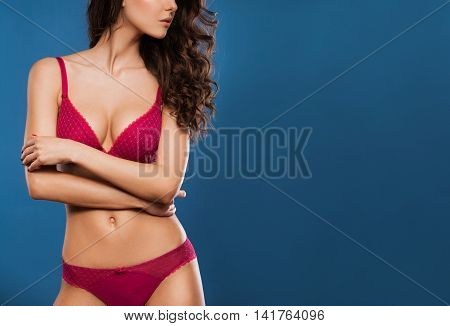Beautiful sporty woman body. Sexy body of a beautiful woman. Slim tanned woman's body. Beautiful sexy female slim tanned body