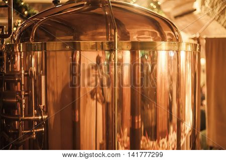 Large copper container for whisky. Whisky production.