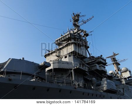 Close-up view of naval ship with guns