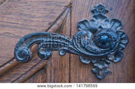 Metal dark stry door handle horizontal format