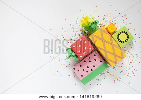 Gifts Wrapped In Colored Paper. Gifts Like Fruit. Fruit Boxes.