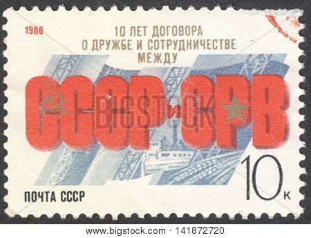 MOSCOW RUSSIA - CIRCA APRIL 2016: a post stamp printed in the USSR dedicated to the 10th Anniversary of USSR-Vietnam Friendship circa 1988