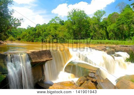 waterfalls background: Namtok Kaeng Sopha is a waterfall and tourist attraction in Wang Thong district of Phitsanulok Province in Thailand.