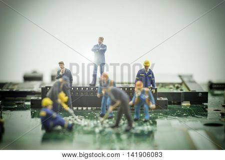 mini boss check the worker do the job on motherboard with light fare - can use to display or montage on products