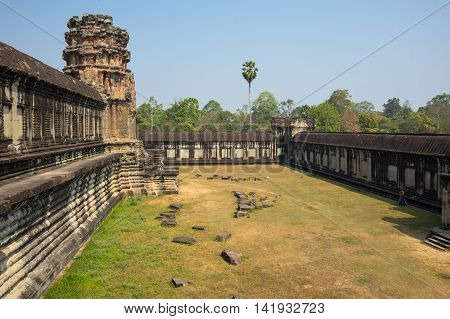 Angkor Wat temple in Cambodia. Angkor Wat is the largest Hindu temple complex and religious monument in the world