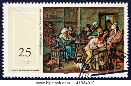 GERMANY - CIRCA 1982: a stamp printed in Germany shows Farmers Company Painting by Adriaen Brouwer Flemish Painter circa 1982