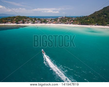 Aerial view of a motorboat going on Phangan island, Thailand