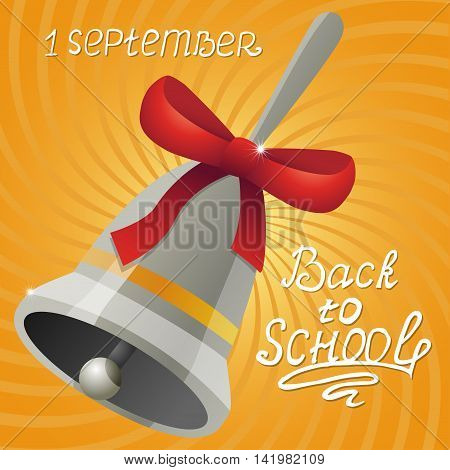 The first school bell with the inscription 1 September and back to school.