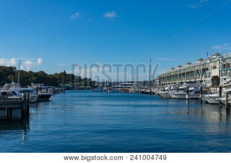 Yachts And Boats On Berth In Bay On Sunny Day In Woolloomooloo Suburb Of Sydney, Australia