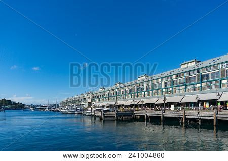 Wharf And Bay With Blue Water On Sunny Day. Woolloomooloo Suburb In Sydney, Australia