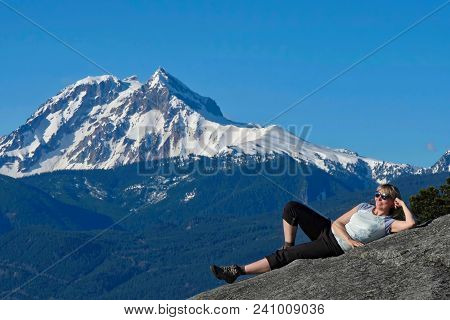 Summer Vacation Travel Around Vancouver. Happy Smiling Person Hiking In Whistler Cheaf Peak. Beautif