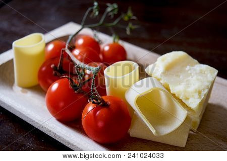 Paccheri Of Gragnano With Parmesan Cheese And Cherry Tomatoes
