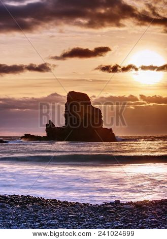 The Rest Of The Day In Rocky Bay. Evening Light On The Rocks, Boulders And Cliff Face Of Talisker Ba