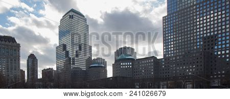 Modern City Architecture. Sky And Clouds Reflection In Skyscrappers In City