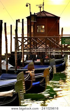 Evening Dreams: Gondolas Alongside The Grand Canal, Venice, Italy At Sunset