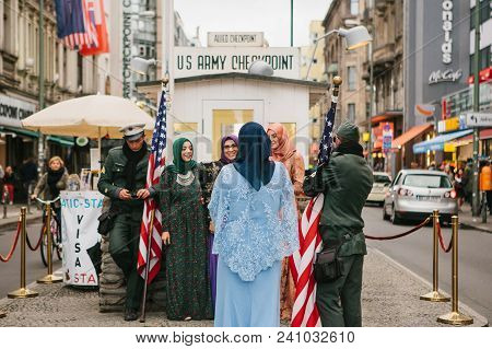 Berlin, October 1, 2017: Positive Peaceful Cheerful Beautiful Arab Women In Traditional Costumes Com