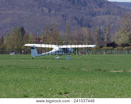 Bielsko-biala, Poland On April 2018: Close-up To White Pipistrel Virus Sw Airplane On Grassy Airfiel