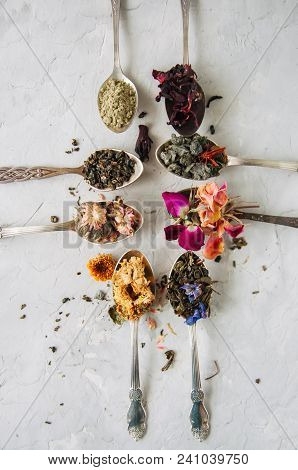 Various Flavors Of Tea. Green Tea Flower Tea Matcha Karkade In Spoons. Flat Lay.