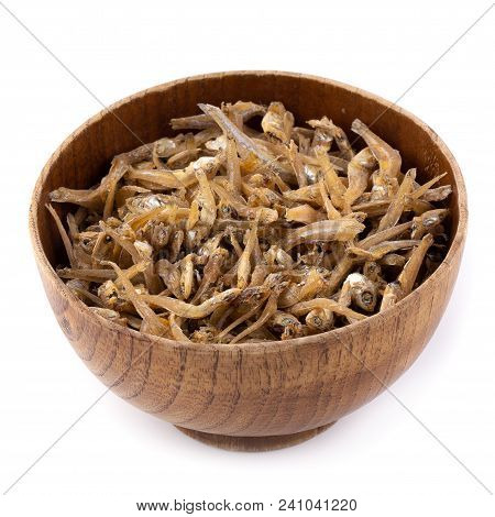 Dried Anchovies Fish Isolated On White Background.