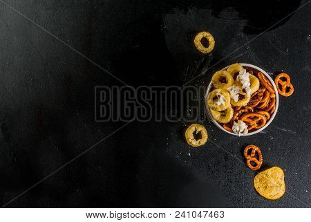 Variation Different Unhealthy Snacks Crackers, Sweet Salted Popcorn, Tortillas, Nuts, Straws, Bretse