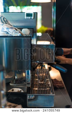Coffee Making  Espresso Pouring From Coffee Machine. Preparation Baverage Concept