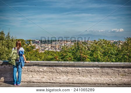 Woman In Janiculum Promenade With Rome Cityscape On The Background, Italy