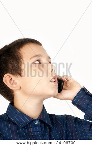 The Boy Talks By A Mobile Phone