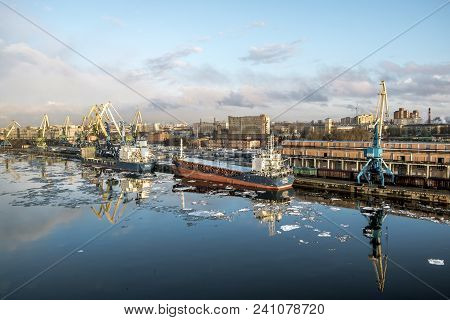 Saint-petersburg.russia.6 April 2018. Cranes  And Ships In The Marine Cargo Port Of Saint-petersburg