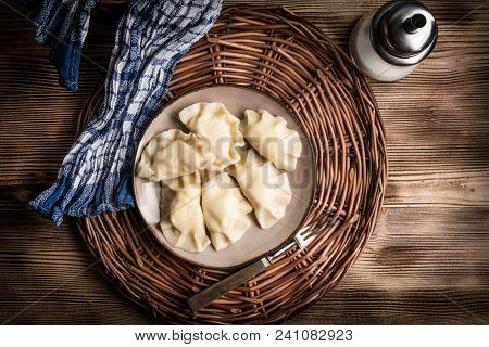 Homemade Dumplings With Cheese On A Plate. Top View.