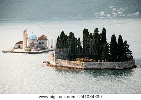 Our Lady Of The Rocks (montenegrin: Gospa Od Skrpjela) Is One Of The Two Islets Off The Coast Of Per