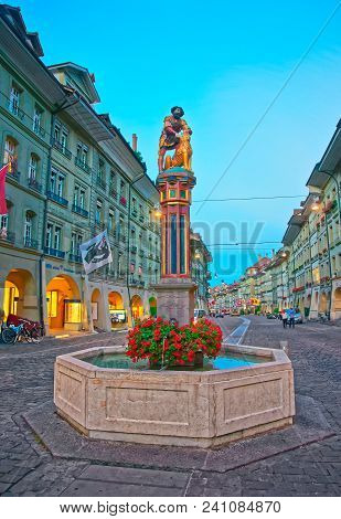Bern, Switzerland - August 21, 2013: Samson Fountain On Kramgasse Street In Old City Center Of Bern,