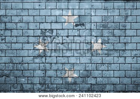 Micronesia Flag Is Painted Onto An Old Brick Wall