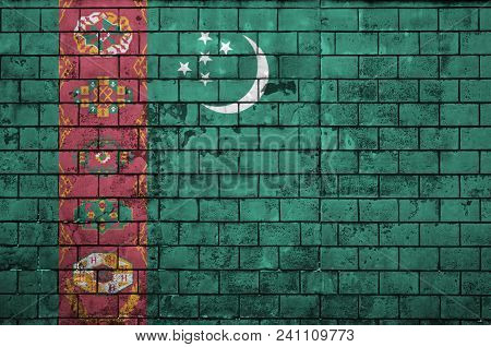 Turkmenistan Flag Is Painted Onto An Old Brick Wall