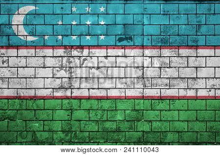 Uzbekistan Flag Is Painted Onto An Old Brick Wall