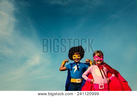 Strong superhero kids with superpowers