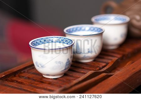 Cropped Shot Of Woman Holding Chawan With Green Oolong.