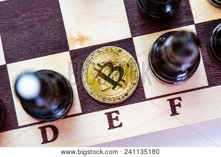 Golden Bitcoin Coins Symbolizes Elements Of Virtual Economy Or Crypto Currency With Chess Board