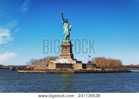 Liberty Island And Statue In Upper New York Bay In New York City, Usa. In Upper New York Bay. Touris