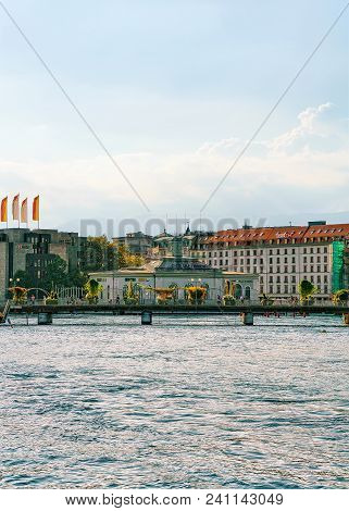 Geneva, Switzerland - August 30, 2016: Pont De La Machine Bridge Above Geneva Lake With A View On Qu