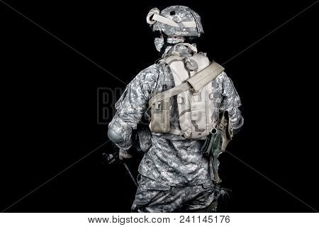 Back View Of Modern Military Forces Infantry, Us Marine Armed With Rifle In Digital Camouflage Comba
