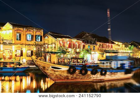 Boat At The Embankment Of Thu Bon River In Hoi An, Vietnam. Late In The Evening