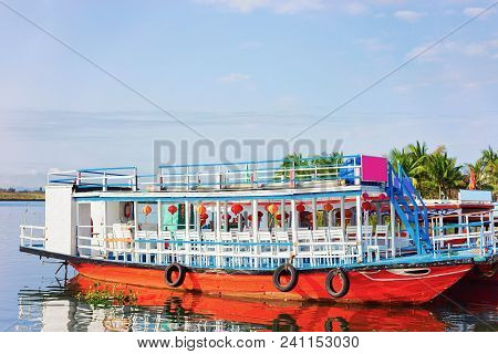 Excursion Boats At The Embankment In Thu Bon River In Hoi An, Vietnam