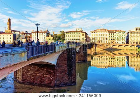 Florence, Italy - October 15, 2016: People At Ponte Alle Grazie Bridge In Florence In Italy.