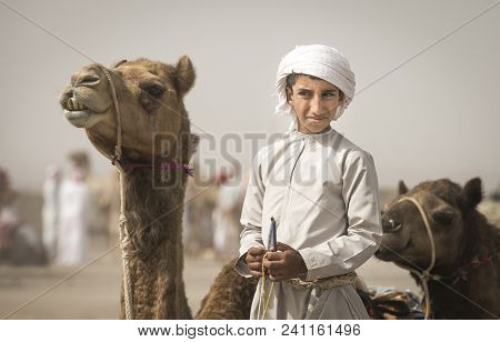 Ibri, Oman, 28th April 2018: Omani Men At A Traditional Horse Race Event Where Young Riders Show The