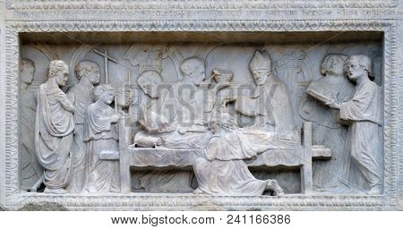 MODENA, ITALY - JUNE 04: Panel with episodes of the life of St. Geminiano, by Agostino di Duccio of about 1442, Modena Cathedral, Italy on June 04, 2017.