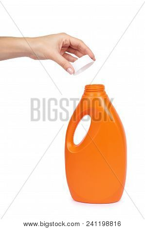 Orange Plastic Detergent Bottle With Hand Isolated On White Background.