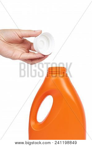 Orange Plastic Detergent Bottle With Hand Isolated On White Background.