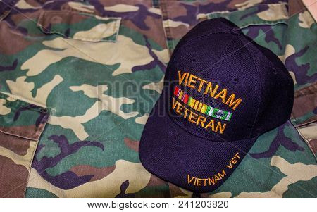 Vietnam Veteran Hat On Jungle Greens Camouflage Uniform