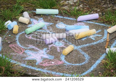 Colorful Chalk On A Playground In Summer