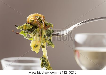 Closeup Of Spaetzle With Spinach, A Bavarian Speciality